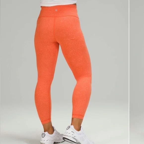 Lululemon Wunder Train High-Rise Tight 25"
Crunch Warm Coral - Picture 2 of 4